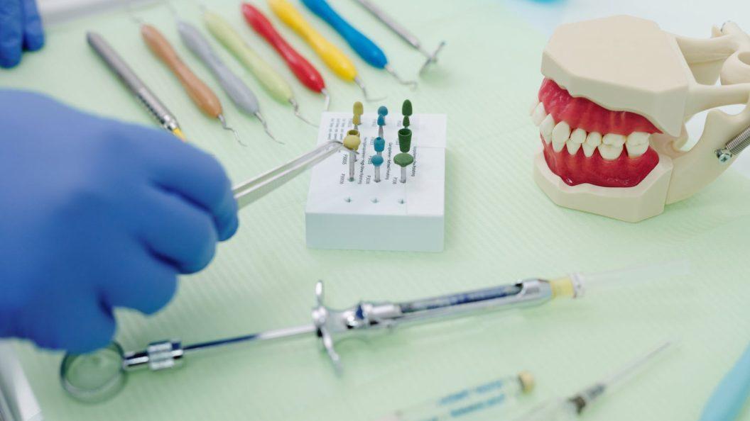 Dental instruments laid out for a tooth extraction procedure